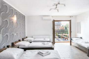 Фото номера Четырехместный номер &quot;Комфорт&quot; Отели типа «постель и завтрак» Resort Pod Lasem г. Kolonowskie 3